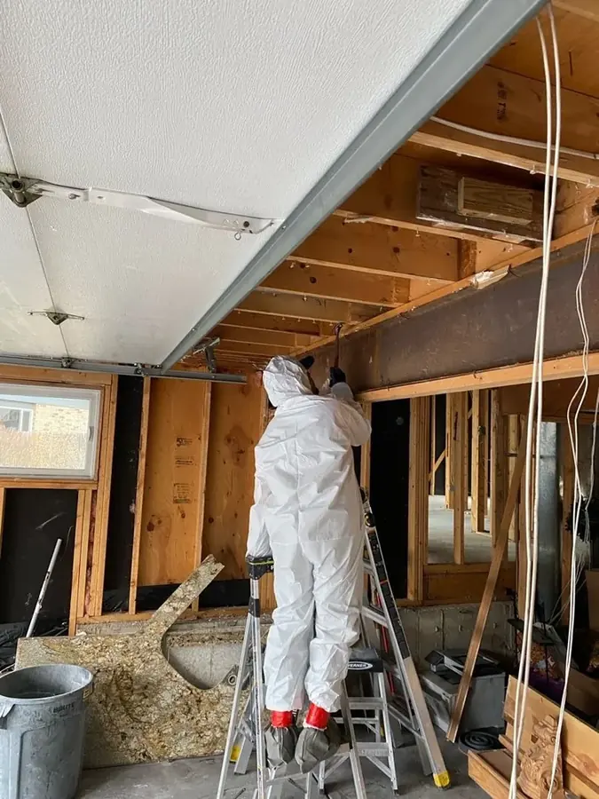 Framing opened to dry a wall cavity