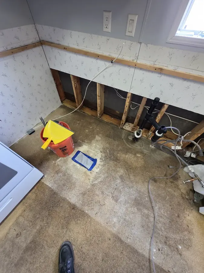 Attic framing opened after a roof leak